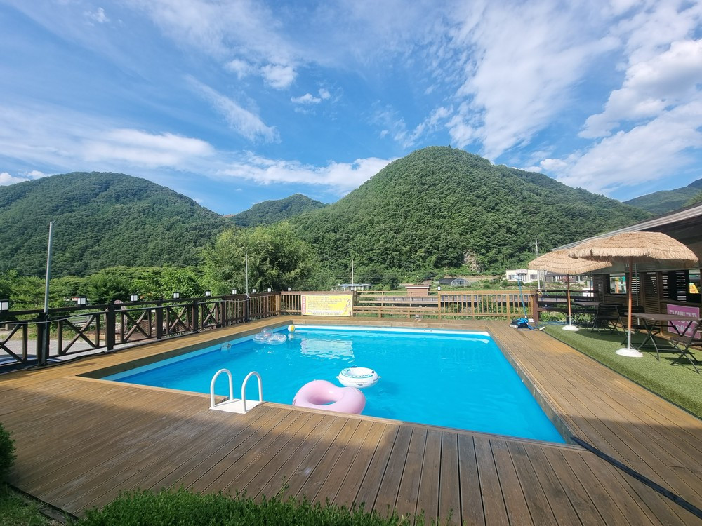 꽃들의물감찾기펜션 이미지